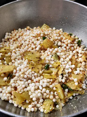 Sabudana Khichdi | Maharashtrian Sabudanyachi Khichadi https://thespicycafe.com/wp-content/uploads/2021/02/17-Sabudana-khichadi-khichdi-Maharashtrian-breakfast-snack-vrat-upvas-fasting-navratri-mahashivratri-ashadi-ekadashi-tapioca-upma-Indian-vegetarian-gluten-free-recipe.jpg https://thespicycafe.com/how-to-make-sabudana-khichdi/