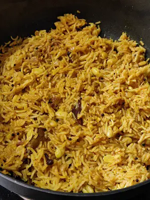 Valachi Khichadi | Dalimbi Bhaat | Vaal Bhaat (वालाची खिचडी / डाळिंबी भात) https://thespicycafe.com/wp-content/uploads/2023/03/03-valachi-khichdi-khichadi-maharashtrian-traditional-authentice-dalimbi-bhat-bhaat-masale-bhat-vegan-vegetarian-festive-easy-quick-simple-indian-pulao-biryani-kadve-vaal-1.jpg https://thespicycafe.com/valachi-khichdi-dalimbi-bhaat-recipe/