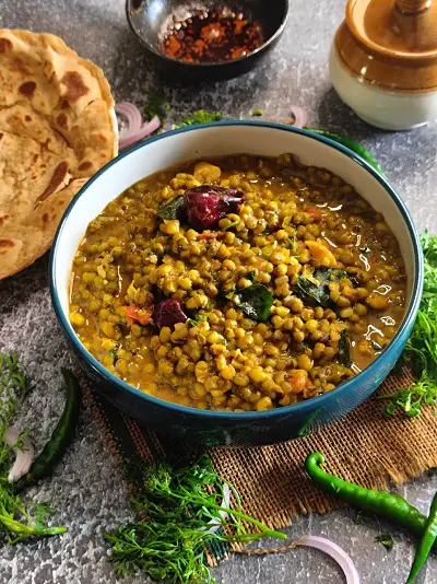 Hirvya Mugachi Usal | Green Moong Dal Curry | Green Gram Curry https://thespicycafe.com/wp-content/uploads/2023/05/140-green-moong-dal-curry-mung-beans-green-gram-hirvya-mugachi-usal-vegan-vegetarian-keto-protein-diabetic-friendly-simple-quick-easy-healthy-nutritious-lunch-dinner-indian-meal.jpg https://thespicycafe.com/green-moong-dal-curry/