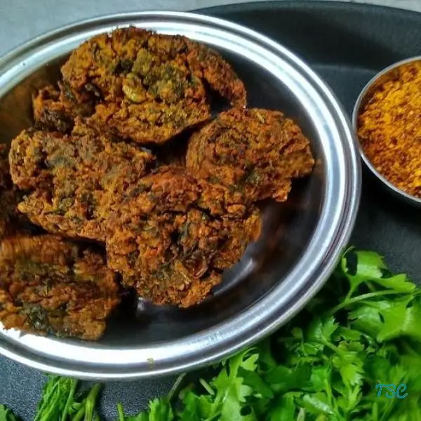 Kothimbir Vadi | How to make Popular Maharashtrian Kothimbir Vadi https://thespicycafe.com/wp-content/uploads/2020/12/kothimbir-vadi-vegan-and-healthy-maharashtrian-recipe-1.jpg https://thespicycafe.com/tag/kothimbir-vadi/