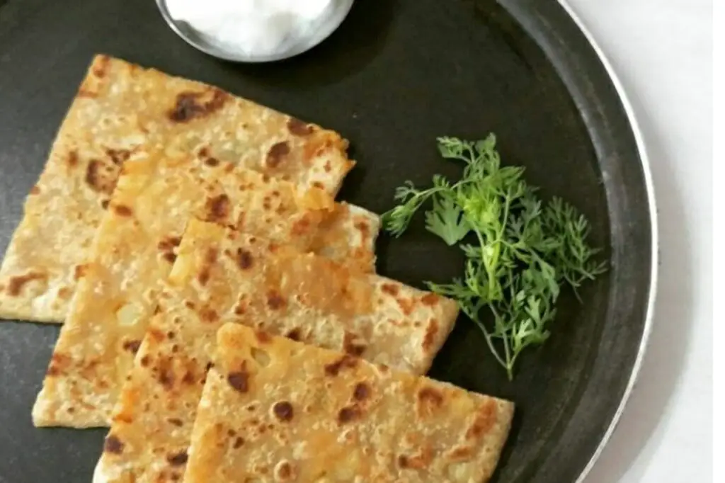 6 Unique Difference Between Thepla and Paratha https://thespicycafe.com/wp-content/uploads/2021/03/difference-between-thepla-and-paratha-methi-thepla-stuffed-aloo-paratha-indian-popular-famous-breakfast.png https://thespicycafe.com/food_faqs/6-unique-difference-between-thepla-and-paratha/