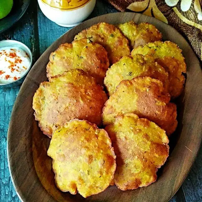 Khamanga Dudhi Bhoplyache Vade | Lauki ki Poori | Bottle Gourd Poori https://thespicycafe.com/wp-content/uploads/2021/03/IMG_07032021_140026_450_x_450_pixel.jpg https://thespicycafe.com/how-to-make-dudhi-bhoplyache-vade-lauki-ki-poori/