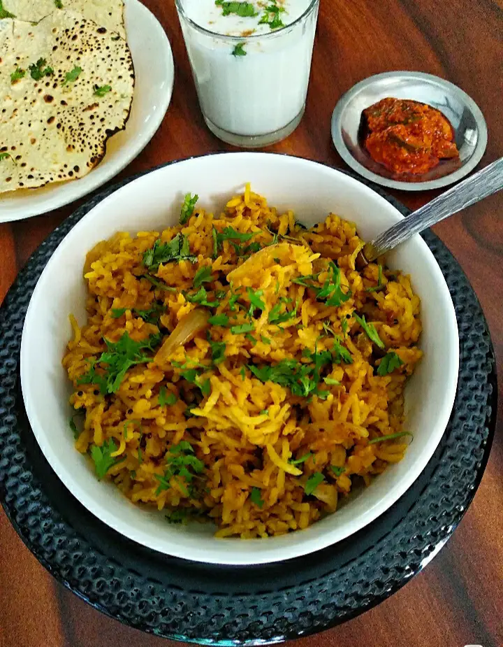 Vegan Moong Dal Masala Khichdi | Split Yellow Moong Khichdi Recipe https://thespicycafe.com/wp-content/uploads/2021/07/vegan-masala-moong-dal-khichdi-glutenfree-indian-meal-vegetarain.jpg https://thespicycafe.com/tag/masala-khichdi/