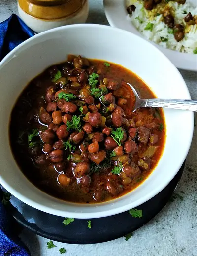 Harbaryachi Usal - Chana Masala - Black Chickpea Curry https://thespicycafe.com/wp-content/uploads/2021/08/final-chana-masala-curry.png https://thespicycafe.com/chana-masala-recipe/