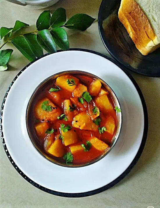 Kanda Batata Rassa Bhaji (Maharashtrian Style) - Onion Potato Curry https://thespicycafe.com/wp-content/uploads/2021/09/edited-kanda-batata-rassa-bhaji-maharashtrian-curry-vegan-vegetable.jpg https://thespicycafe.com/tag/maharashtrian-bhaji/