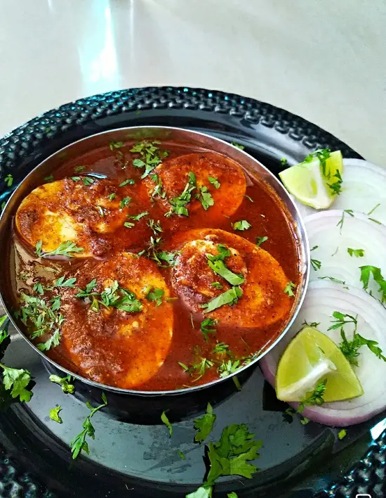 Egg Curry Recipe With Coconut | Anda Curry https://thespicycafe.com/wp-content/uploads/2021/11/egg-curry-anda-curry-indian-curry-recipe-spicy-delicious-simple-easy-curry-with-coconut-maharashtrian-style.jpg https://thespicycafe.com/coconut-based-egg-curry-recipe/