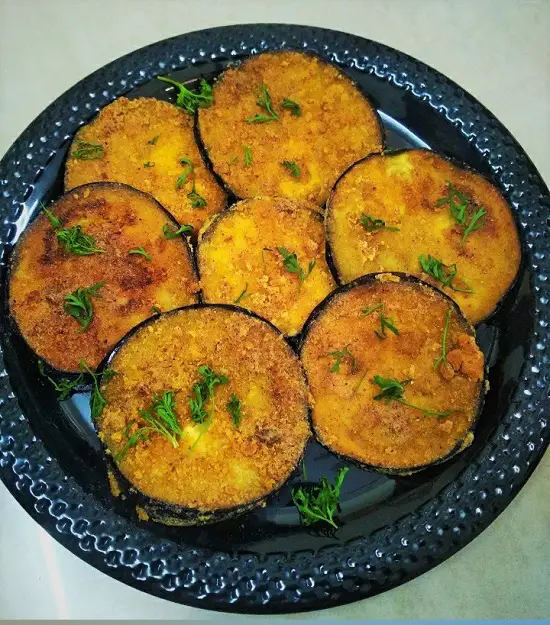 Vangyache Kaap | Pan Fried Crispy Eggplant Fritters https://thespicycafe.com/wp-content/uploads/2021/11/kurkurit-vangyanche-kaap-eggplant-fritters-pan-fried-vegan-vegetarian.jpg https://thespicycafe.com/vangyache-kaap-crispy-pan-fried-eggplant-recipe/