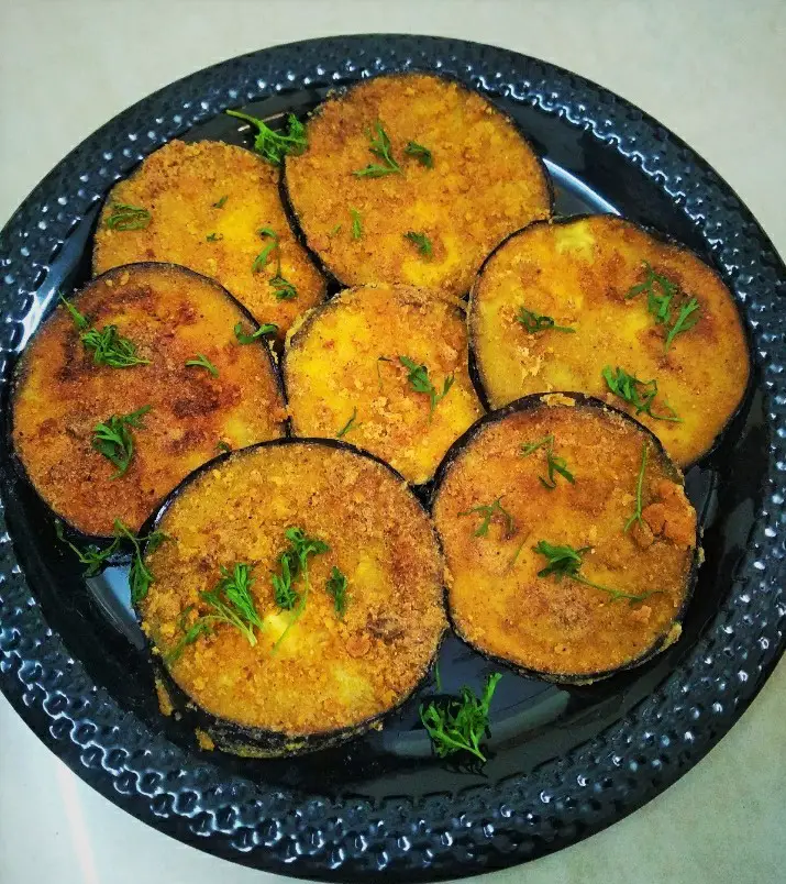 Vangyache Kaap | Pan Fried Crispy Eggplant Fritters https://thespicycafe.com/wp-content/uploads/2021/11/kurkurit-vangyanche-kaap-eggplant-fritters-pan-fried-vegan-vegetarian.jpg https://thespicycafe.com/vangyache-kaap-crispy-pan-fried-eggplant-recipe/