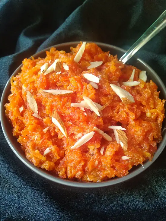 Gajaracha Halwa | Gajar Ka Halwa - Carrot Pudding https://thespicycafe.com/wp-content/uploads/2021/12/gajar-halwa-gajar-ka-halwa-poori-carrot-pudding-vegetarian-indian-sweet-dessert-recipe.jpg https://thespicycafe.com/tag/indian-sweets/