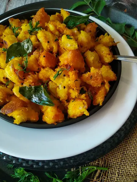 Pavacha Sheera | Bread Upma - Savoury Tempered Bread Bites https://thespicycafe.com/wp-content/uploads/2022/02/IMG_20220206_163832.jpg https://thespicycafe.com/bread-upma-savoury-tempered-bread-bites-recipe/