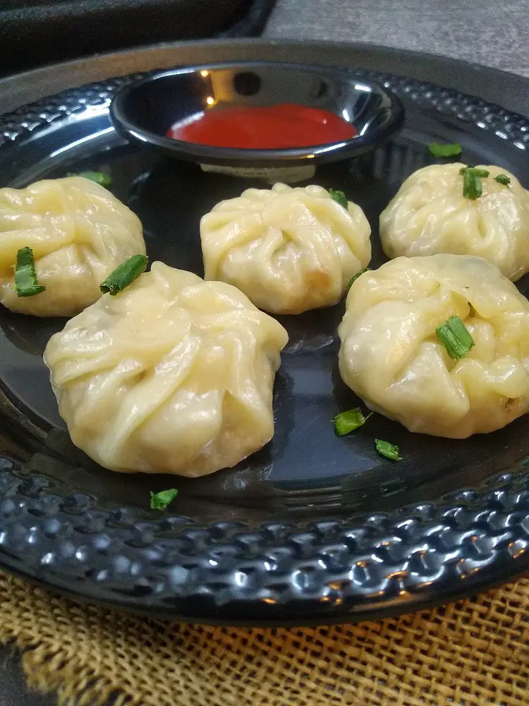 How To Make Vegetable Momos https://thespicycafe.com/wp-content/uploads/2022/04/momos-vegetable550.jpg https://thespicycafe.com/how-to-make-vegetable-momos-recipe/