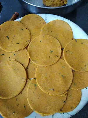 Lal Bhoplyachi Puri - Pumpkin Masala Puri https://thespicycafe.com/wp-content/uploads/2022/06/Vegan-kaddu-ki-puri-pumpkin-puffed-poori.jpg https://thespicycafe.com/pumpkin-masala-puri-recipe/