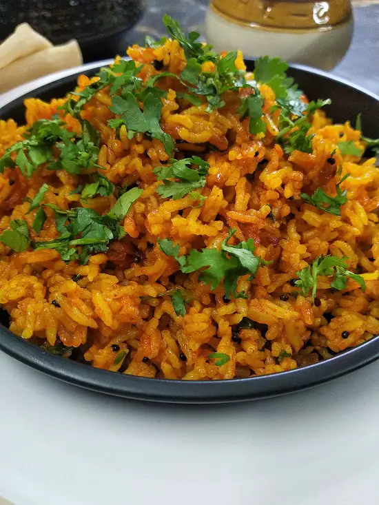 Phodnicha Bhat (Maharashtrian Style Fried Rice) https://thespicycafe.com/wp-content/uploads/2022/07/phonicha-rice.jpg https://thespicycafe.com/phodnicha-bhat-maharashtrian-style-fried-rice/