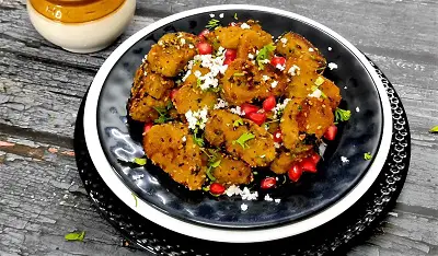 Dudhi Muthiya | Lauki Muthiya Recipe | Steamed Bottle Gourd Dumplings https://thespicycafe.com/wp-content/uploads/2022/07/dudhi-muthiya-lauki-muthiya-popular-gujarati-indian-snack-recipe.jpg https://thespicycafe.com/dudhi-muthiya/