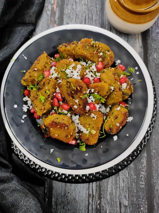 Dudhi Muthiya | Lauki Muthiya Recipe | Steamed Bottle Gourd Dumplings https://thespicycafe.com/wp-content/uploads/2022/07/dudhi-muthiya-lauki-muthiya-popular-gujarati-indian-snack-recipe.jpg https://thespicycafe.com/dudhi-muthiya/