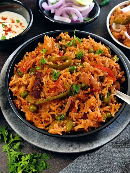 Tawa Pulao Recipe (Mumbai Street Style) https://thespicycafe.com/wp-content/uploads/2023/01/1-tawa-pulao-street-style-mumbai-street-food-style-pav-bhaji-pulao-pulav-rice-vegan-vegetarian-gluten-free-indian-recipe.jpg https://thespicycafe.com/category/vegan-recipes/