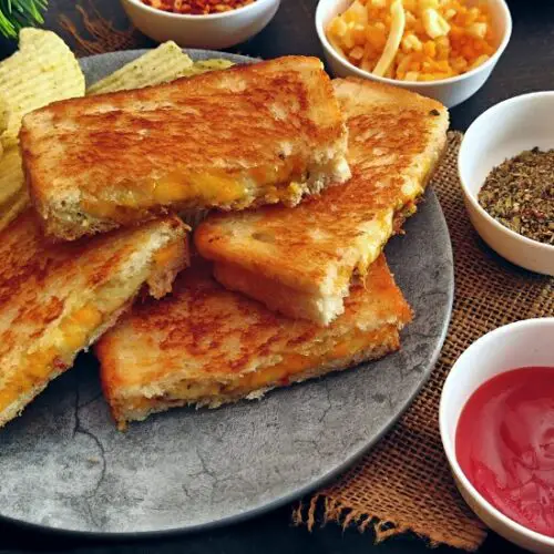 Simple Cheese Toast Sandwich | Plain Cheese Toast Sandwich https://thespicycafe.com/wp-content/uploads/2023/01/2-plain-simple-cheese-sandwich-indian-snack-street-food-vegetarian-breakfast-recipe.jpg https://thespicycafe.com/cheese-toast-sandwich/