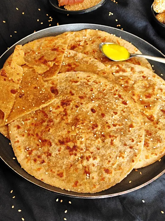Gul Poli | Gud Poli | Til Gul Poli -Maharashtrian Recipe https://thespicycafe.com/wp-content/uploads/2023/01/GUL-POLI-MAHARASHTRIAN-TIL-GUL-POLI-GUD-POLI.jpg https://thespicycafe.com/tag/indian-snack-recipes/