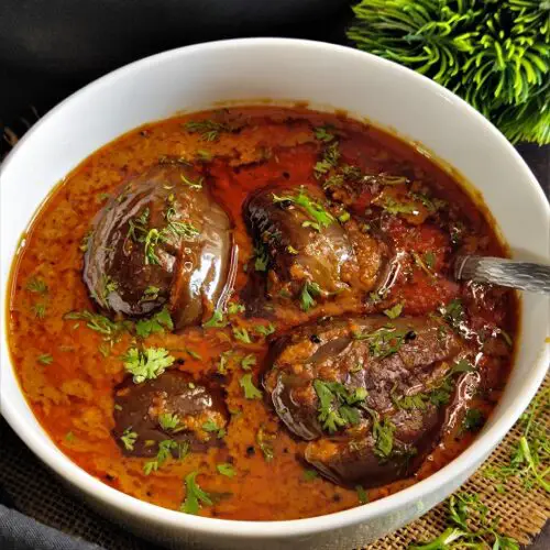 Bharli Vangi Maharashtrian Style | Stuffed Eggplant Curry Indian Recipe https://thespicycafe.com/wp-content/uploads/2023/08/1-bharli-vangi-bharwa-baingan-stuffed-eggplants-aubergine-peanut-curry-vegan-vegetarian-easy-quick-simple-brinjal-curry-lunch-dinner-gravy-indian-maharashtrian-vangi.png https://thespicycafe.com/bharli-vangi/