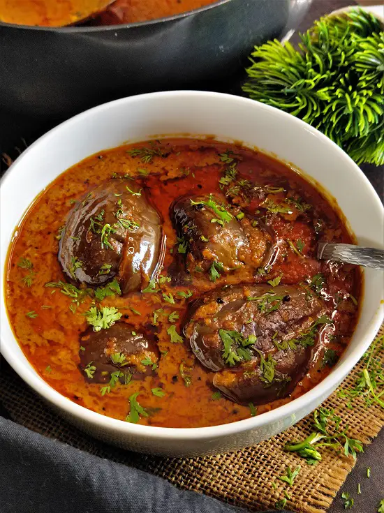 Bharli Vangi Maharashtrian Style | Stuffed Eggplant Curry Indian Recipe https://thespicycafe.com/wp-content/uploads/2023/01/maharashtiran-bharli-vangi-recipe-bharwa-baingan-stuffed-eggplants-vegan-vegetarian-curry-recipe.jpg https://thespicycafe.com/category/no-onion-garlic-recipes/