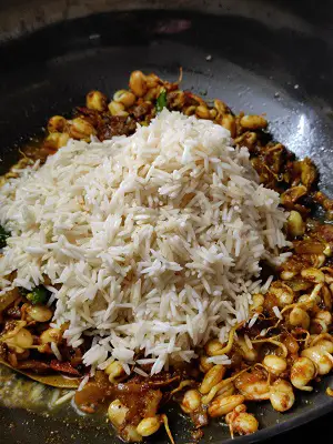 Valachi Khichadi | Dalimbi Bhaat | Vaal Bhaat (वालाची खिचडी / डाळिंबी भात) https://thespicycafe.com/wp-content/uploads/2023/03/03-valachi-khichdi-khichadi-maharashtrian-traditional-authentice-dalimbi-bhat-bhaat-masale-bhat-vegan-vegetarian-festive-easy-quick-simple-indian-pulao-biryani-kadve-vaal-1.jpg https://thespicycafe.com/valachi-khichdi-dalimbi-bhaat-recipe/