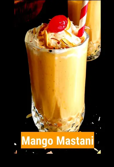 Mango Mastani Recipe https://thespicycafe.com/wp-content/uploads/2023/04/12-mango-mastani-indian-mango-milkshake-vegetarian-vanilla-ice-cream-smoothie-summer-drink-beverage-delicious-easy-quick-simple-snack-breakfast-kids-recipe.jpg https://thespicycafe.com/mango-mastani-recipe/