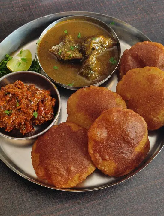 Chicken Masala | Chicken Curry Recipe https://thespicycafe.com/wp-content/uploads/2023/04/4-12-tandlache-vade-malvani-vade-kombdi-vade-rice-poori-chawal-ki-poori-vegetarian-vegan-snack-breakfast-curries-vegetables-dals-chicken-mutton-maharashtraian-recipes.jpg https://thespicycafe.com/tag/malvani-chicken-recipe/