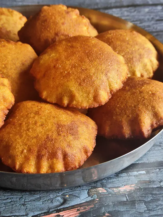 Tandalache Vade | Malavani Vade | Rice Poori https://thespicycafe.com/wp-content/uploads/2023/06/tandlache-vade-malvani-vade-kombdi-vade-rice-poori-puffed.jpg https://thespicycafe.com/tag/chicken-curry/