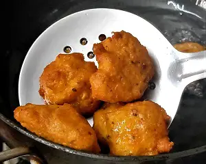 Moong Dal Pakoda | Moong Dal Vada | Moong Dal Bhajiya Recipe https://thespicycafe.com/wp-content/uploads/2023/07/11-1-moong-dal-pakoda-monsoon-snack-moong-bhajiya-moong-bhajji-bhajee-yellow-mung-bean-fritters-vegan-vegetarian-protein-rich-easy-quick-simple-breakfast-lunch-dinner.png https://thespicycafe.com/moong-dal-pakoda-recipe/