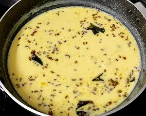 Maharashtrian Kadhi Recipe | Sweet & Tangy Kadhi Recipe | Yogurt Curry https://thespicycafe.com/wp-content/uploads/2023/08/1-Maharashtrian-kadhi-recipe-vegetarian-proteinrich-curd-yogurt-curry-sweet-tangy-spicy-easy-quick-simple-lunch-dinner-soup-bowl-Indian-curry-kadhi-pakoda.png https://thespicycafe.com/maharashtrian-kadhi-recipe/