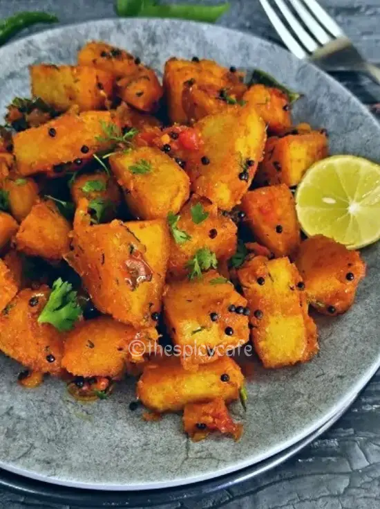 Masala Idli Fry Recipe From Leftover Idlis | How To Make Masala Idli https://thespicycafe.com/wp-content/uploads/2023/08/1masala-idli-south-indian-breakfast-recipe-leftover-vegan-easy-quick-simple-snack-lunch-dinner.png https://thespicycafe.com/masala-idli-fry-recipe-from-leftover-idlis-how-to-make-masala-idli/
