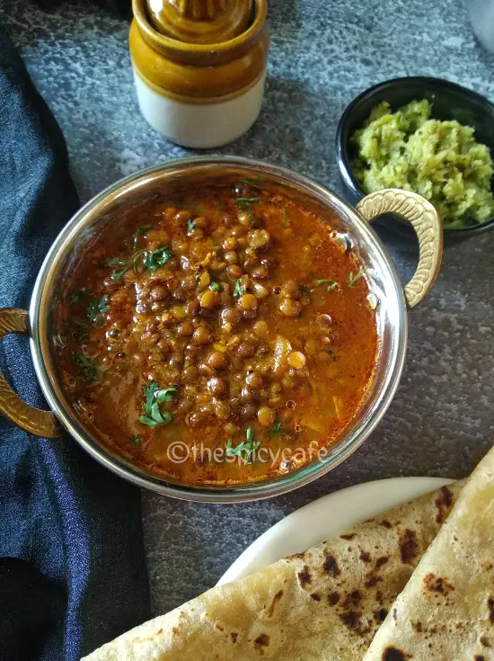 Masoor Dal | Whole Brown Lentil Curry https://thespicycafe.com/wp-content/uploads/2023/09/1-brown-lentil-curry-vegan-saboot-sabut-masoor-dal-vegan-vegetarian-protein-rich-diabetic-friendly-Indian-curry-lunch-dinner-thespicycafe.png https://thespicycafe.com/masoor-dal-curry-brown-lentil-curry-recipe/