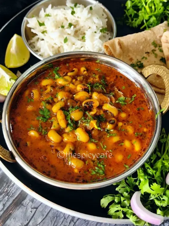 Black-Eyed Peas Curry | Chavali Chi Usal | Lobia Masala https://thespicycafe.com/wp-content/uploads/2023/10/1-black-eyed-beans-curry-chawli-usal-lobia-masala-vegan-vegetarian-heatlhy-nutritoius-protein-rich-diabetic-friendly-lunch-dinner-brunch-breakfast-easy-curry-recipe-1.jpg https://thespicycafe.com/black-eyed-bean-curry-recipe/