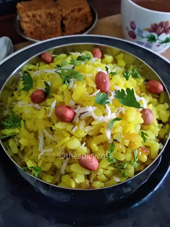 Kanda Poha Recipe (Maharashtrian Breakfast) |Kande Pohe Recipe https://thespicycafe.com/wp-content/uploads/2023/11/1-kande-pohe-maharashtrian-breakfast-recipe-easy-quick-simple-tea-time-snack-vegan-vegetarian-batata-pohe-lunch-dinner-brunch.png https://thespicycafe.com/tag/indian-breakfast/
