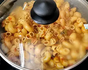 Masala Macaroni Pasta Indian Style (Desi Pasta) https://thespicycafe.com/wp-content/uploads/2023/11/2-masala-macaroni-pasta-Indian-style-desi-quick-easy-simple-vegetarian-breakfast-snacks-lunch-dinner-one-pot-instant-pot-kids-party-appetizer.png https://thespicycafe.com/masala-macaroni-pasta-indian-style/