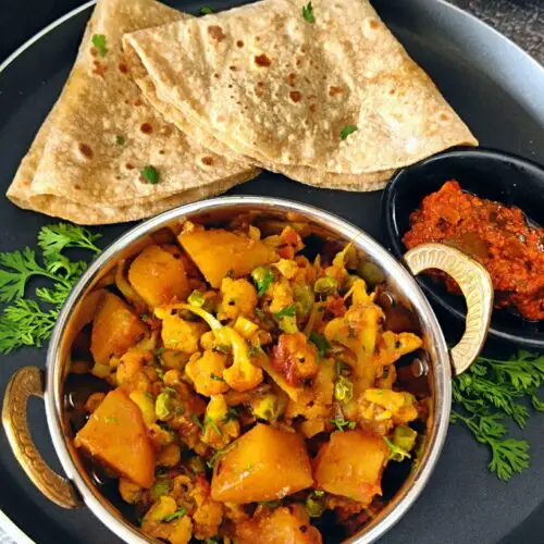 Aloo Gobi Matar Sabji | Cauliflower, Potatoes & Peas Curry https://thespicycafe.com/wp-content/uploads/2024/01/1-aloo-gobi-matar-sabji-cauliflower-potatoes-and-peas-curry-easy-quick-simple-lunch-dinner-sunday-meals-vegan-vegetarian-healthy-tiffin-box-lunch-box-Indian-restaurant-style-recipe.png https://thespicycafe.com/aloo-gobi-matar-sabji-recipe/
